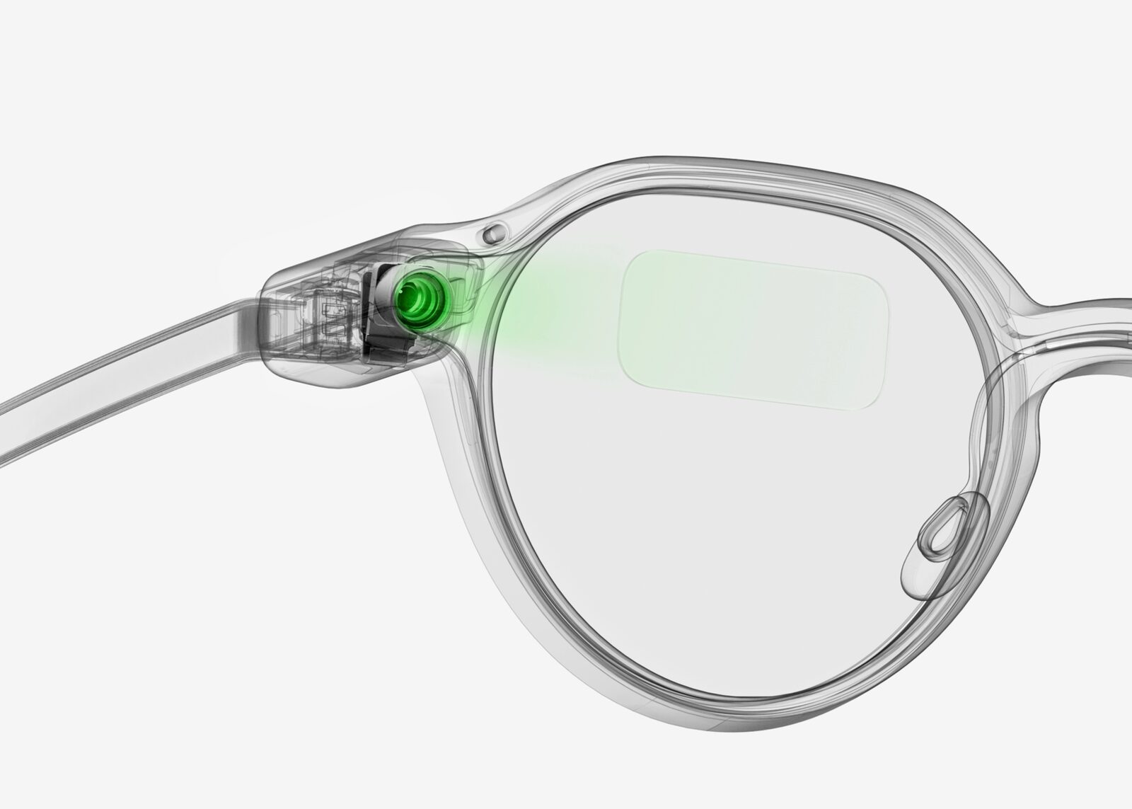 Transparentes Brillengestell der Even Realities G2 mit grün hervorgehobenem Display-Modul am Bügel