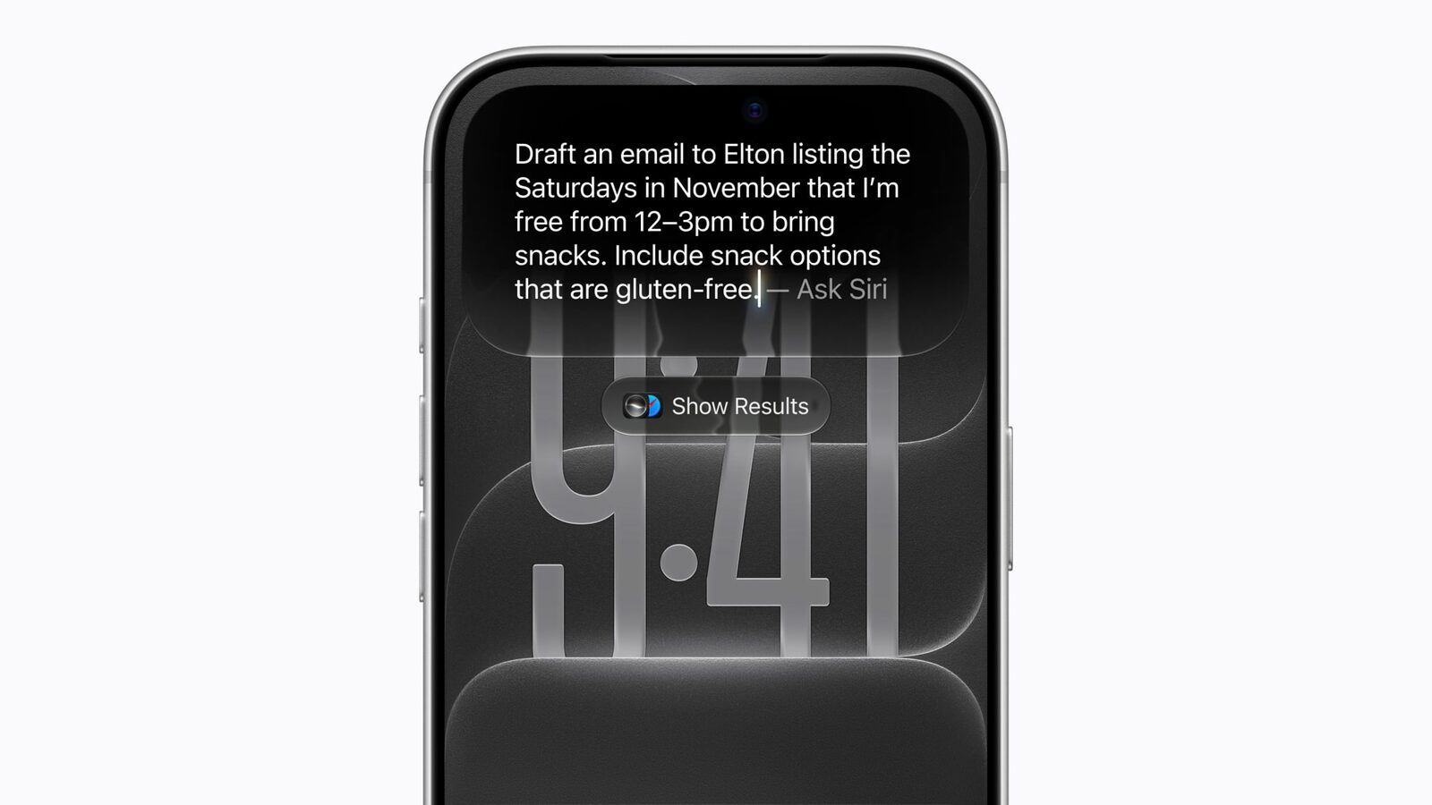 iOS 27 yüklü bir iPhone'un kilit ekranında Siri'ye yazılmış bir e-posta taslağı isteği