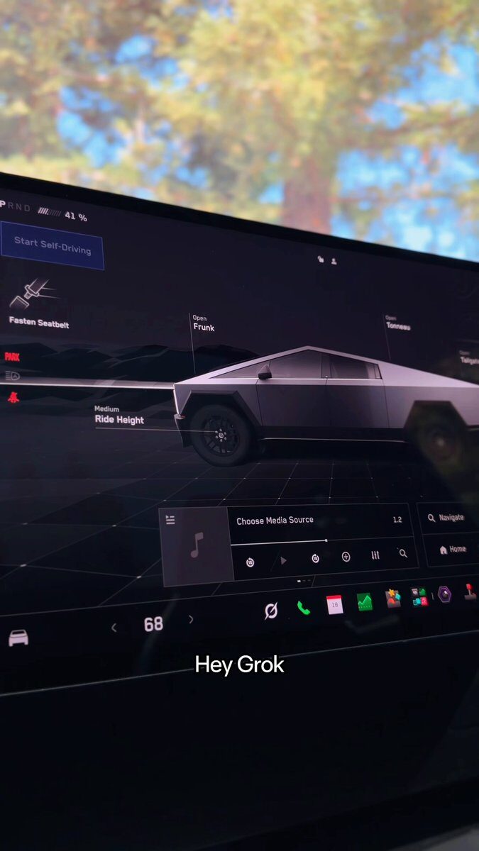 Tesla'nın Grok Bot tanıtım videosundan bir kare: Cybertruck ekranında "Hey Grok" komutu
