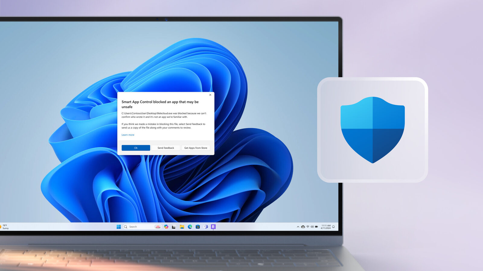 Opengeklapte laptop met de blauwe Windows 11-achtergrond