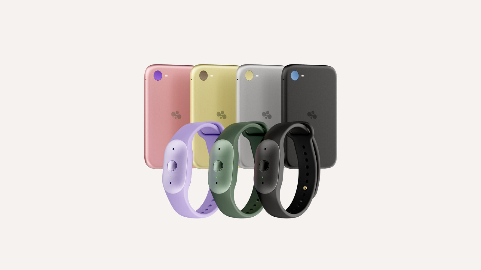 Bee-Eclipse-Module in vier Farben hinter drei Bee-Frontier-Armbändern in Lila, Grün und Schwarz
