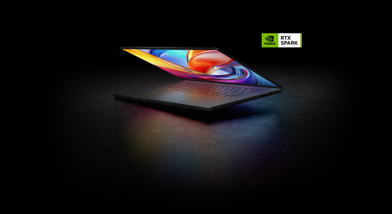 Il notebook ASUS ProArt P16 semiaperto su fondo scuro, con il logo NVIDIA RTX Spark