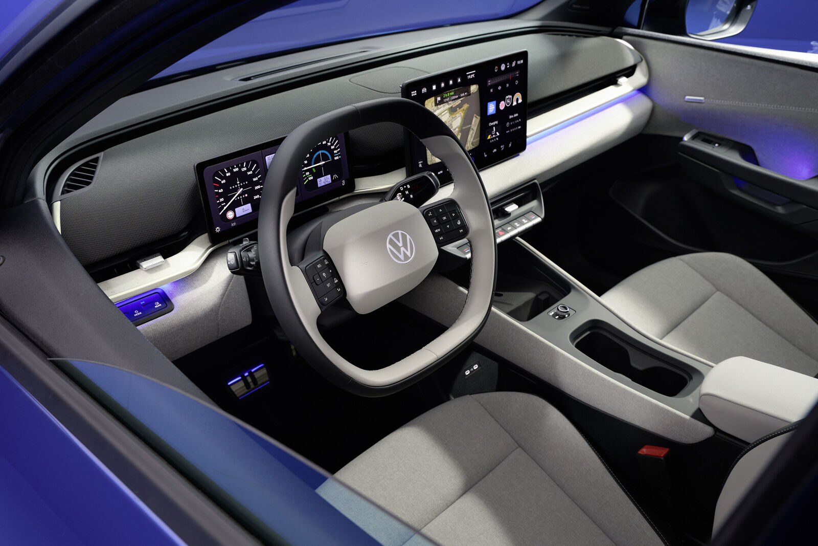 Volkswagen ID. Polo'nun iç mekânı: dijital gösterge, ortada dokunmatik ekran ve açık gri döşeme